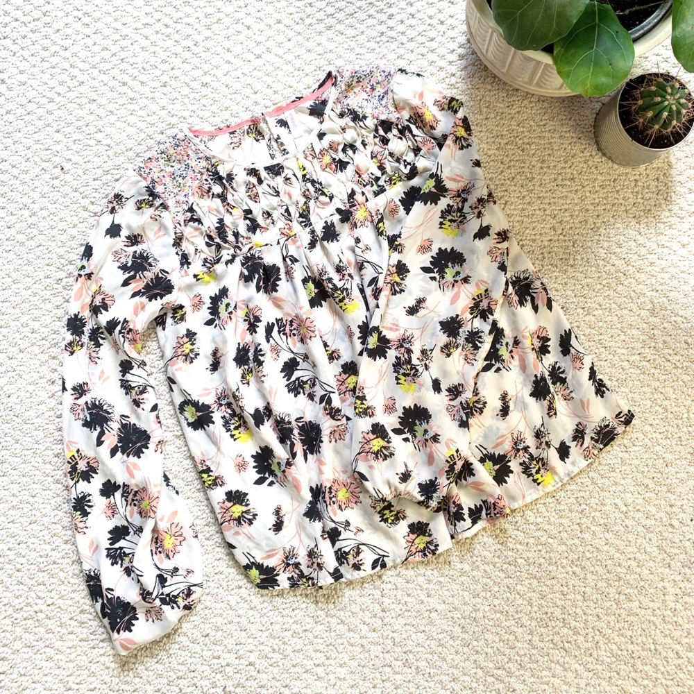 white top with black, pink and yellow flowers